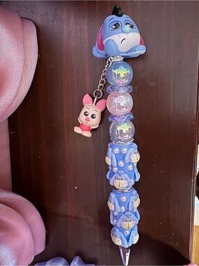 Doorable eeyore character pen with piglet dangle